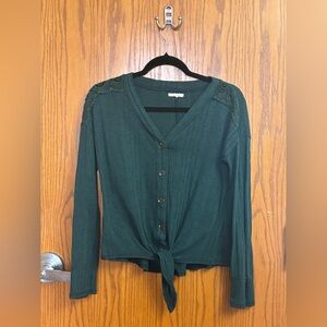 Long sleeve green crop top.